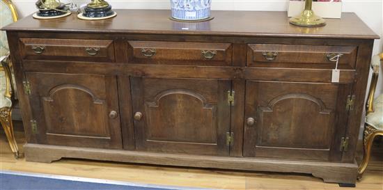 A long oak chest, 193cm wide